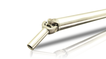 Heavy-duty steel rear driveshaft for Dodge Ram trucks, featuring a two-piece design with universal joints at both ends for durability and smooth power transfer. Engineered for optimal strength and performance in demanding conditions.